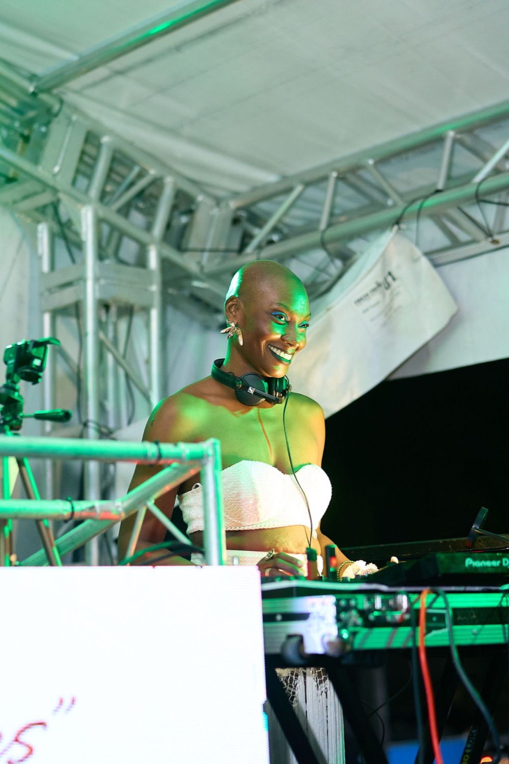 Aset of Kemet performing live in green stage light